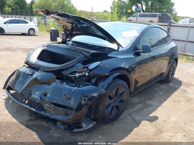 2024 TESLA MODEL Y 7SAYGDED4RF104056 Photo 1