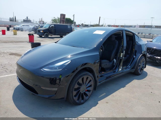 2024 TESLA MODEL Y 7SAYGDED9RF042993 Photo 1