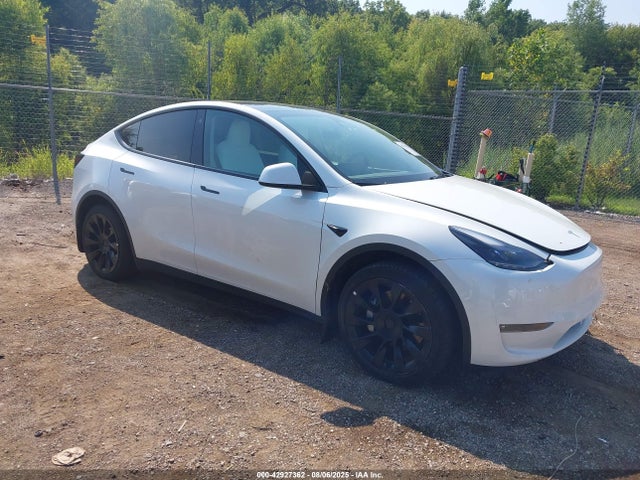 2023 TESLA MODEL Y 7SAYGAEE5PF708297 Photo 0