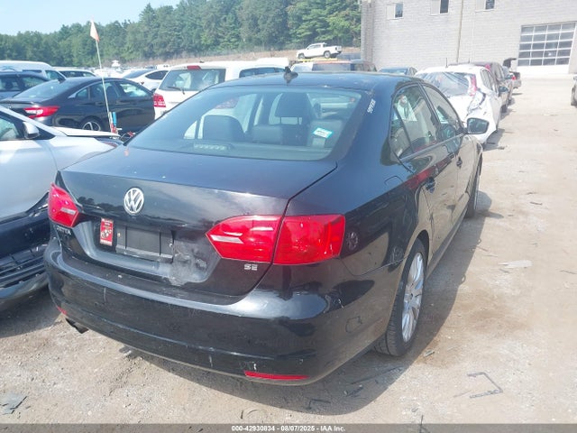 3VWD17AJ1EM264022 Volkswagen Jetta