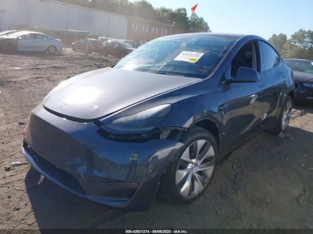 2023 TESLA MODEL Y 7SAYGDEE9PA034329 Photo 1