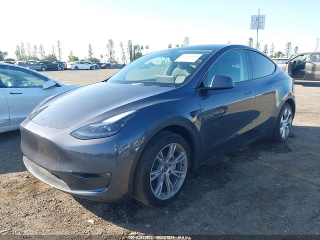 2023 TESLA MODEL Y 7SAYGAEEXPF942046 Photo 1