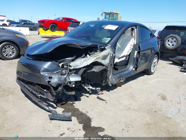2023 TESLA MODEL Y 7SAYGAEE7PF856614 Photo 1