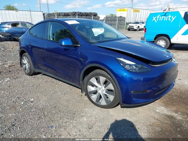 2023 TESLA MODEL Y 7SAYGDEE0PF783328 Photo 0