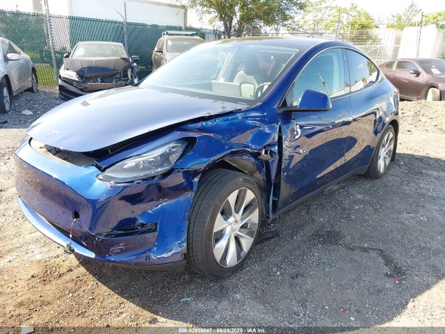 2023 TESLA MODEL Y 7SAYGDEE0PF783328 Photo 1