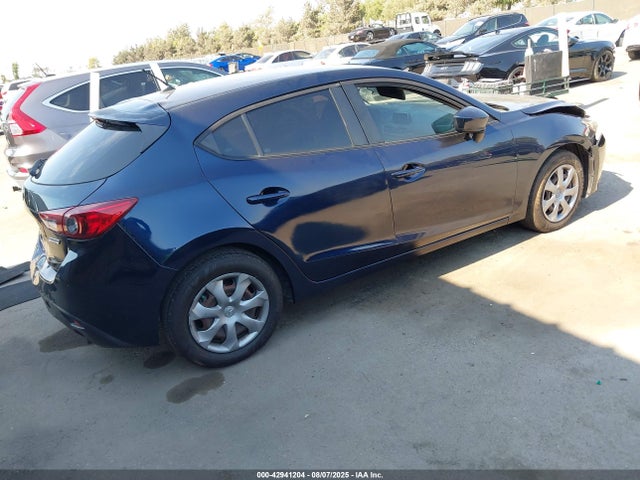 Mazda pe 2014 JM1BM1K73E1116162 Image 4