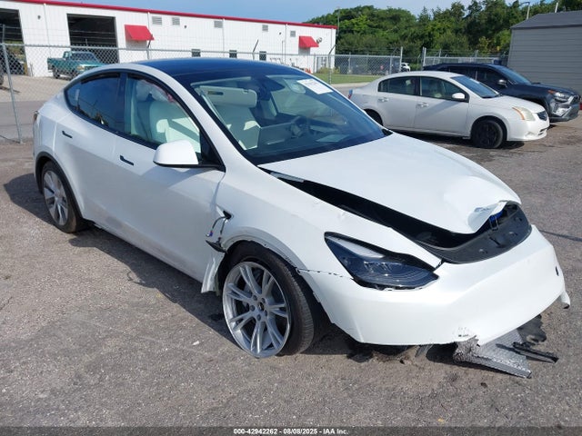 2024 TESLA MODEL Y 7SAYGDEE3RA279534 Photo 0