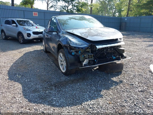 2023 TESLA MODEL Y 7SAYGDEE8PA040638 Photo 0