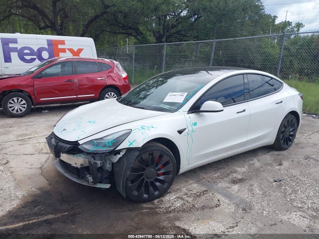 2022 TESLA MODEL 3 5YJ3E1EC4NF105673 Photo 1