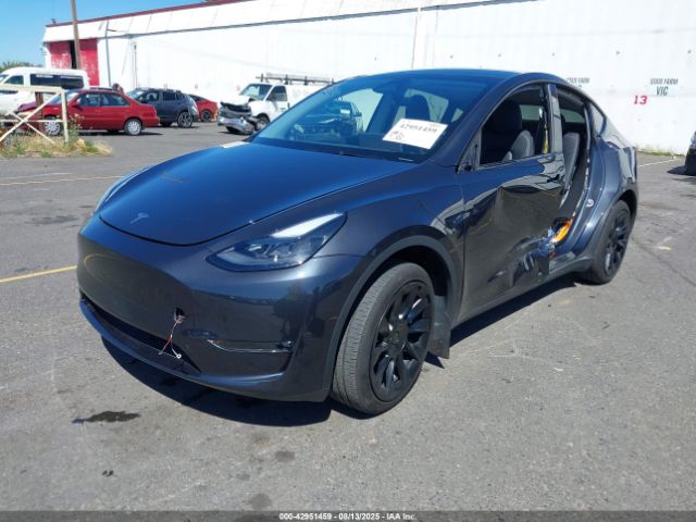 2024 TESLA MODEL Y 7SAYGDEE5RF016223 Photo 1