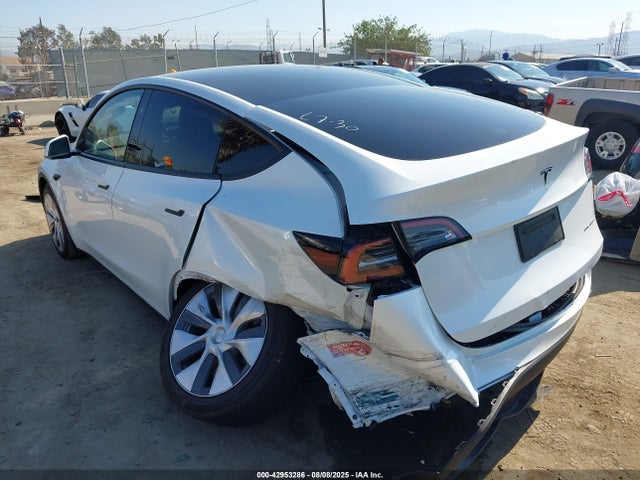 2023 TESLA MODEL Y 7SAYGDEEXPA150557 Photo 2