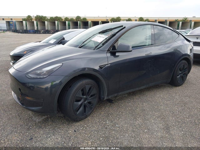 2024 TESLA MODEL Y 7SAYGDED7RF113057 Photo 1