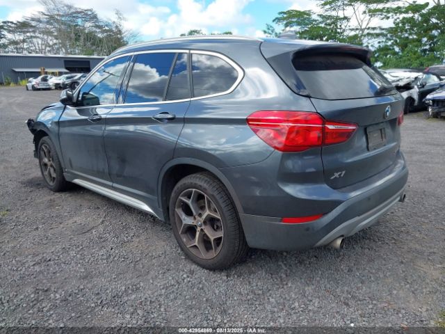 2019 BMW X1 WBXHT3C5XK3H35594 Photo 2