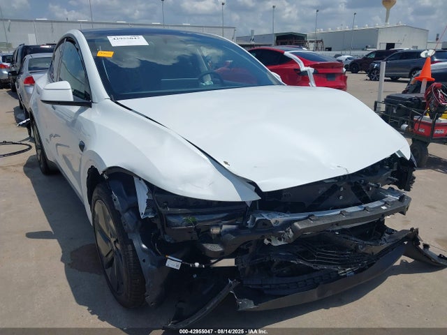 2026 TESLA MODEL Y 7SAYGDEE1TA396729 Photo 5
