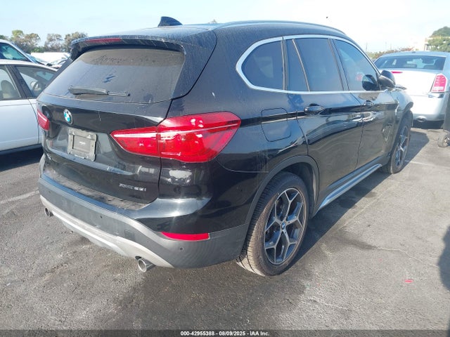 BMW X1 2018 WBXHT3C38J3H31038 Image 4