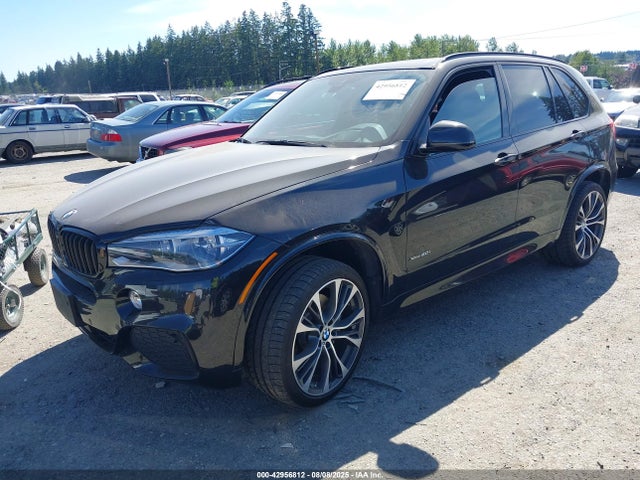 5UXKR6C52E0J71718 BMW 2014