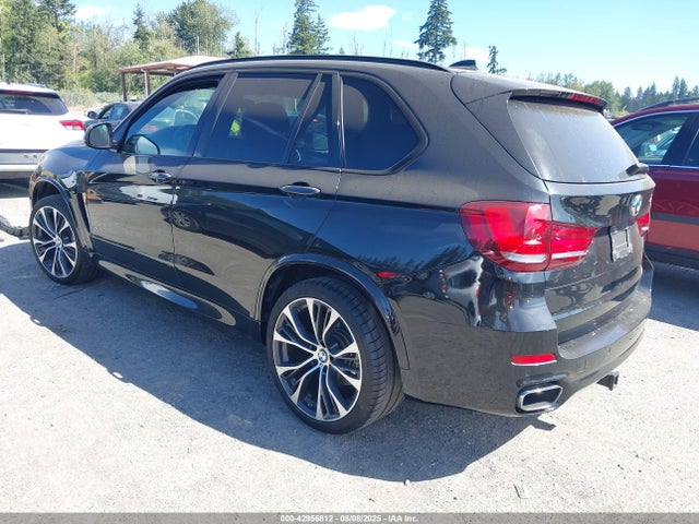 5UXKR6C52E0J71718 BMW 2014