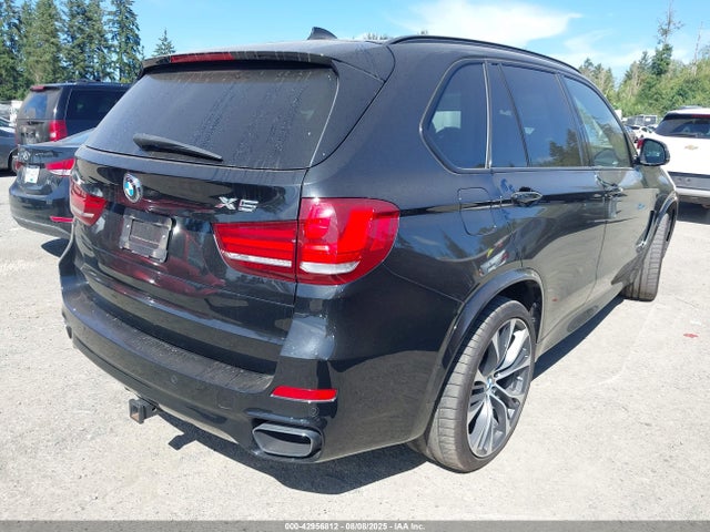 5UXKR6C52E0J71718 BMW 2014