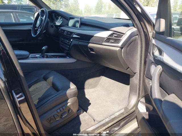 5UXKR6C52E0J71718 BMW 2014