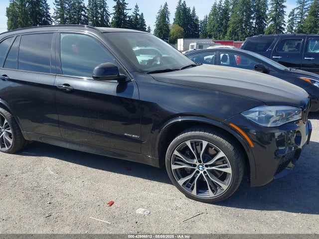 5UXKR6C52E0J71718 BMW 2014