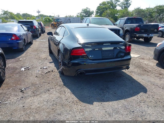 2014 AUDI A7 WAUWGAFC2EN125991 Photo 2