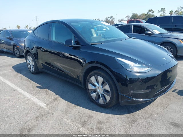 2023 TESLA MODEL Y 7SAYGDED9PF947859 Photo 0