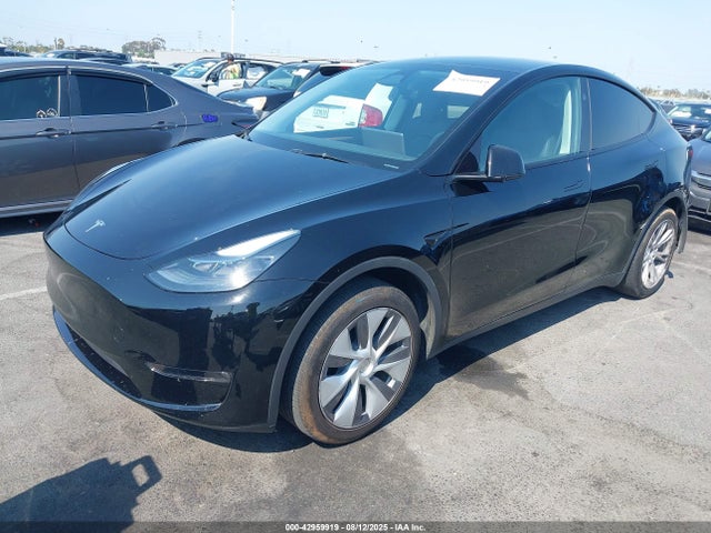2023 TESLA MODEL Y 7SAYGDED9PF947859 Photo 1