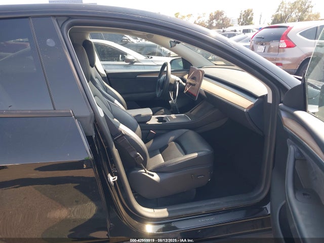 2023 TESLA MODEL Y 7SAYGDED9PF947859 Photo 4