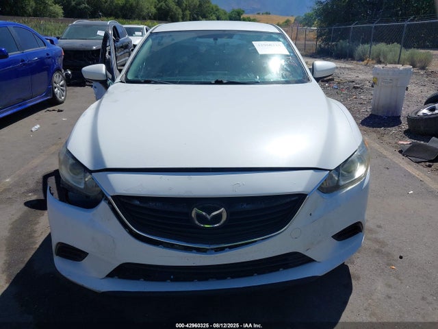 JM1GJ1U53G1423442 Mazda py
