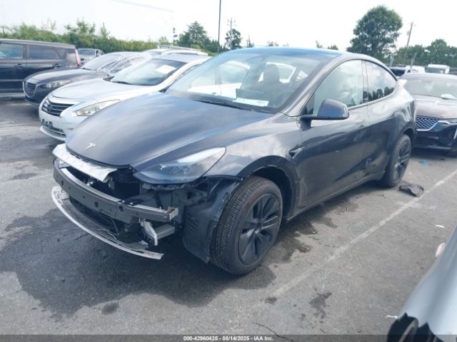 2024 TESLA MODEL Y 7SAYGDED2RA317178 Photo 1