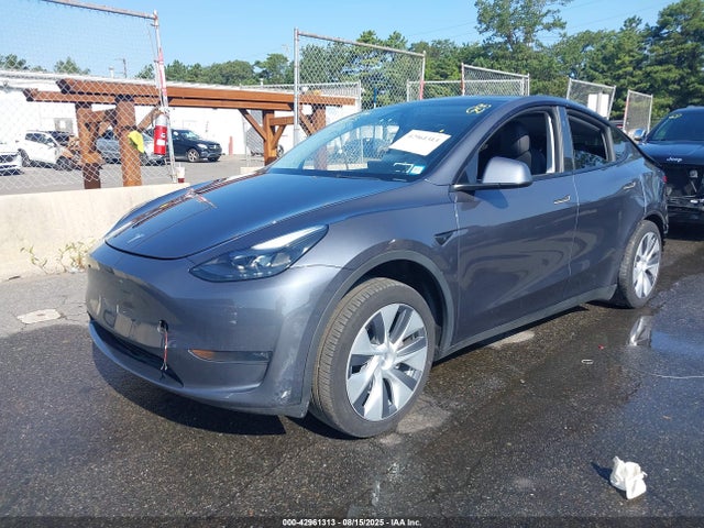 2023 TESLA MODEL Y 7SAYGDEE8PA169124 Photo 1