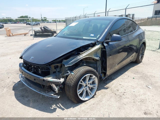 2024 TESLA MODEL Y 7SAYGDED8RF057226 Photo 1