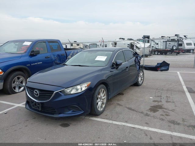JM1GJ1U56G1414220 Mazda py