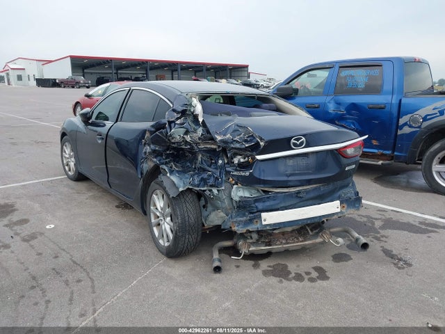 JM1GJ1U56G1414220 Mazda py