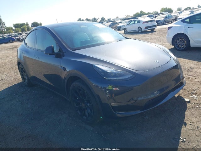 2024 TESLA MODEL Y 7SAYGDEE9RF063173 Photo 0