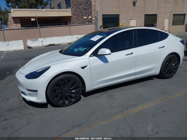 2022 TESLA MODEL 3 5YJ3E1ECXNF295799 Photo 1