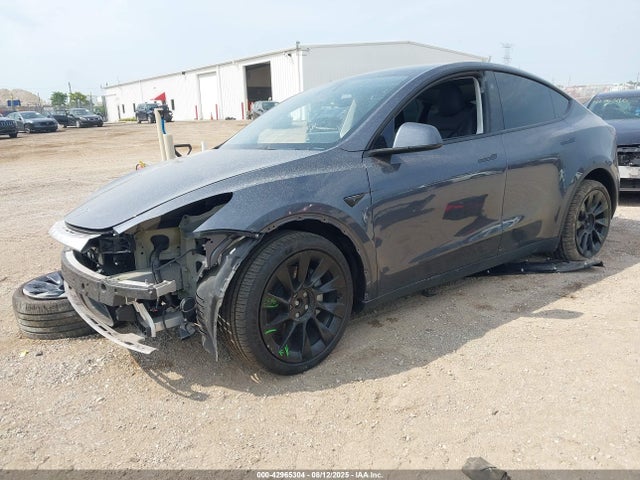 2023 TESLA MODEL Y 7SAYGDEE8PF893950 Photo 1
