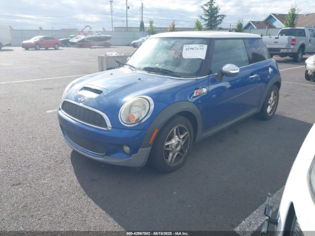 2009 MINI COOPER S WMWMF73529TT94609 Photo 1