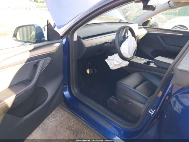 2023 TESLA MODEL Y 7SAYGDED3PF966312 Photo 4