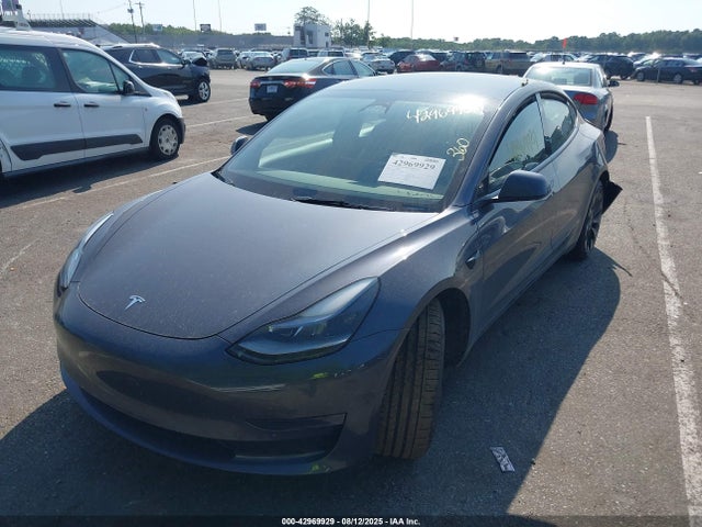 2023 TESLA MODEL 3 5YJ3E1EC7PF690980 Photo 1