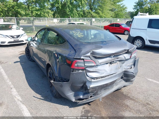 2023 TESLA MODEL 3 5YJ3E1EC7PF690980 Photo 2