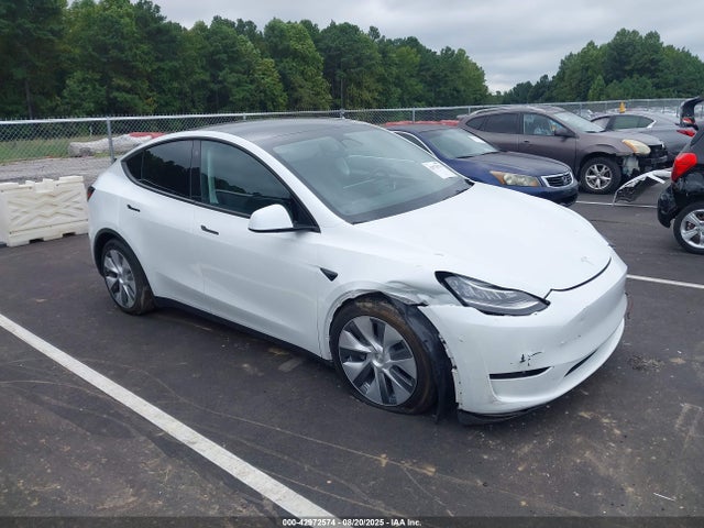2023 TESLA MODEL Y 7SAYGDEE7PA128323 Photo 0