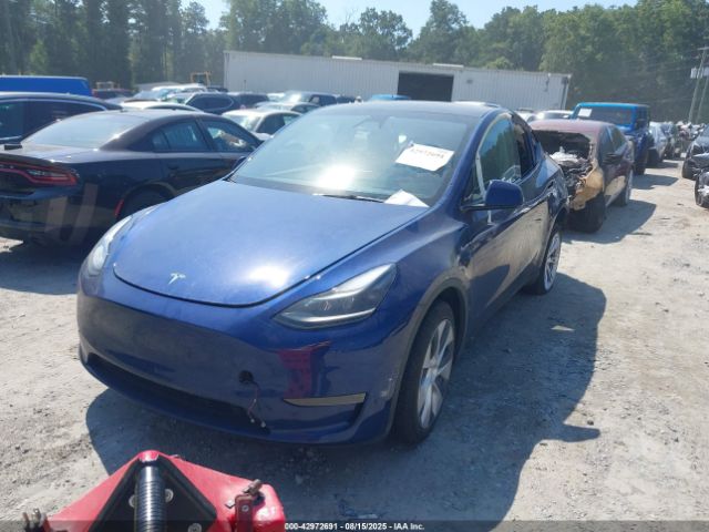 2024 TESLA MODEL Y 7SAYGDEE0RA269284 Photo 1