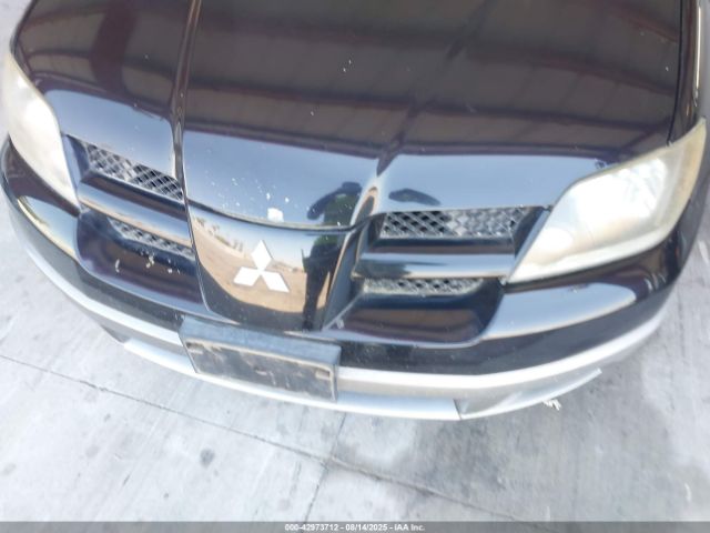 2004 MITSUBISHI OUTLANDER JA4LX31F74U002513 Photo 5