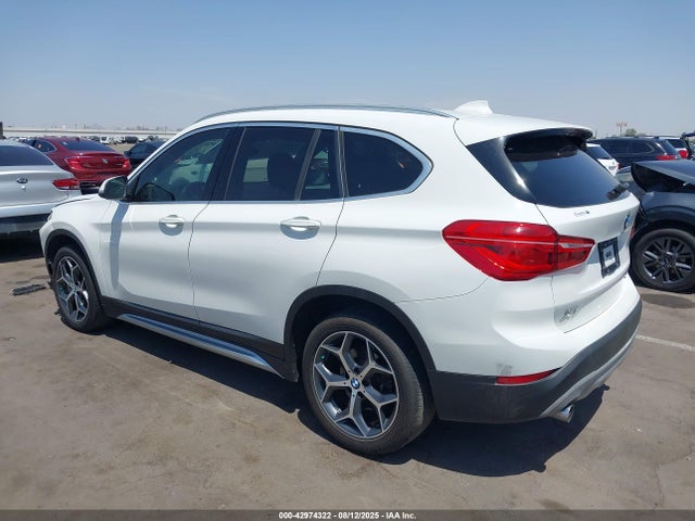 WBXHU7C36J5L07198 BMW X1