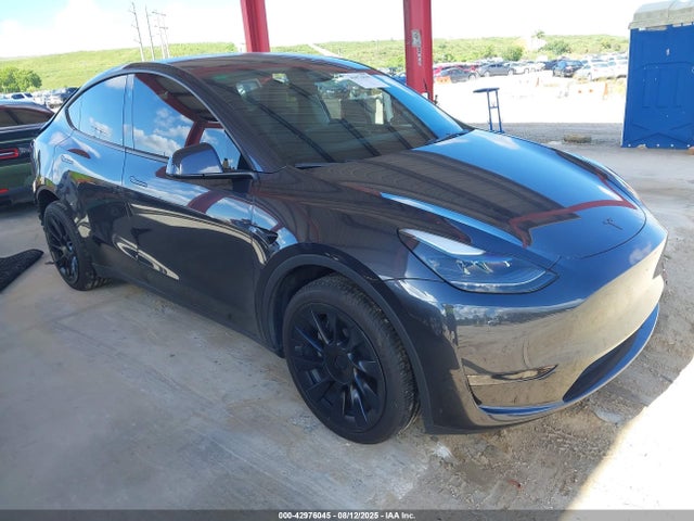 2024 TESLA MODEL Y 7SAYGDED5RF035281 Photo 0
