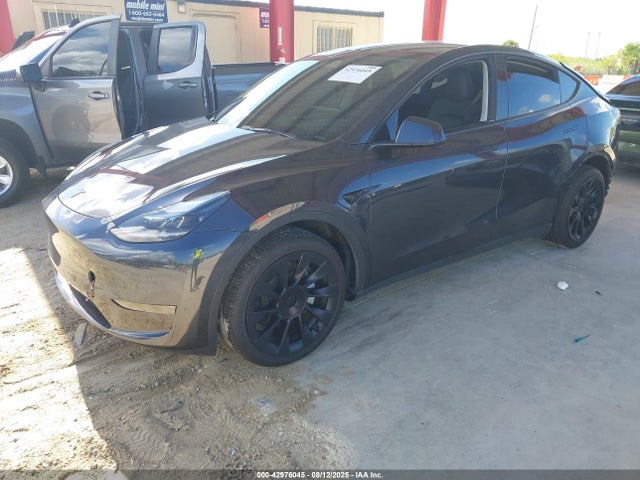 2024 TESLA MODEL Y 7SAYGDED5RF035281 Photo 1