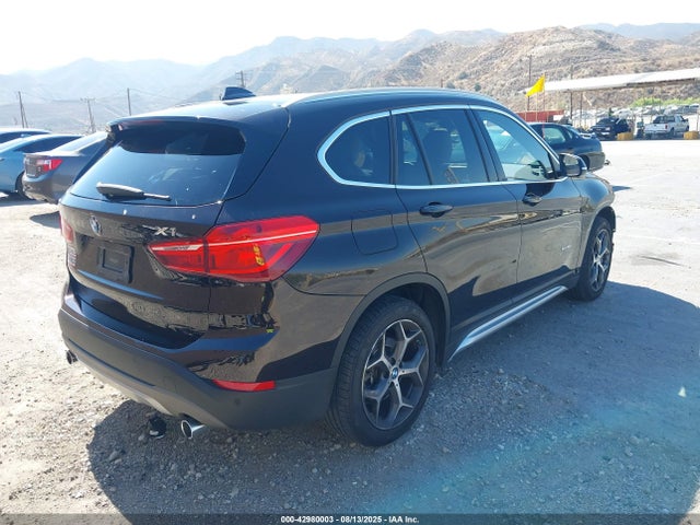 WBXHU7C37J5L05511 BMW X1