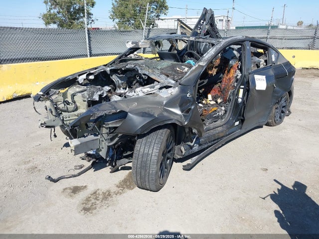 2021 TESLA MODEL Y 5YJYGDEE2MF208477 Photo 1