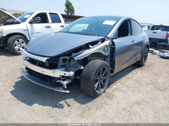 2024 TESLA MODEL Y 7SAYGDEE6RA300764 Photo 1